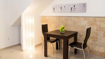 Studio, Balcony | In-room dining