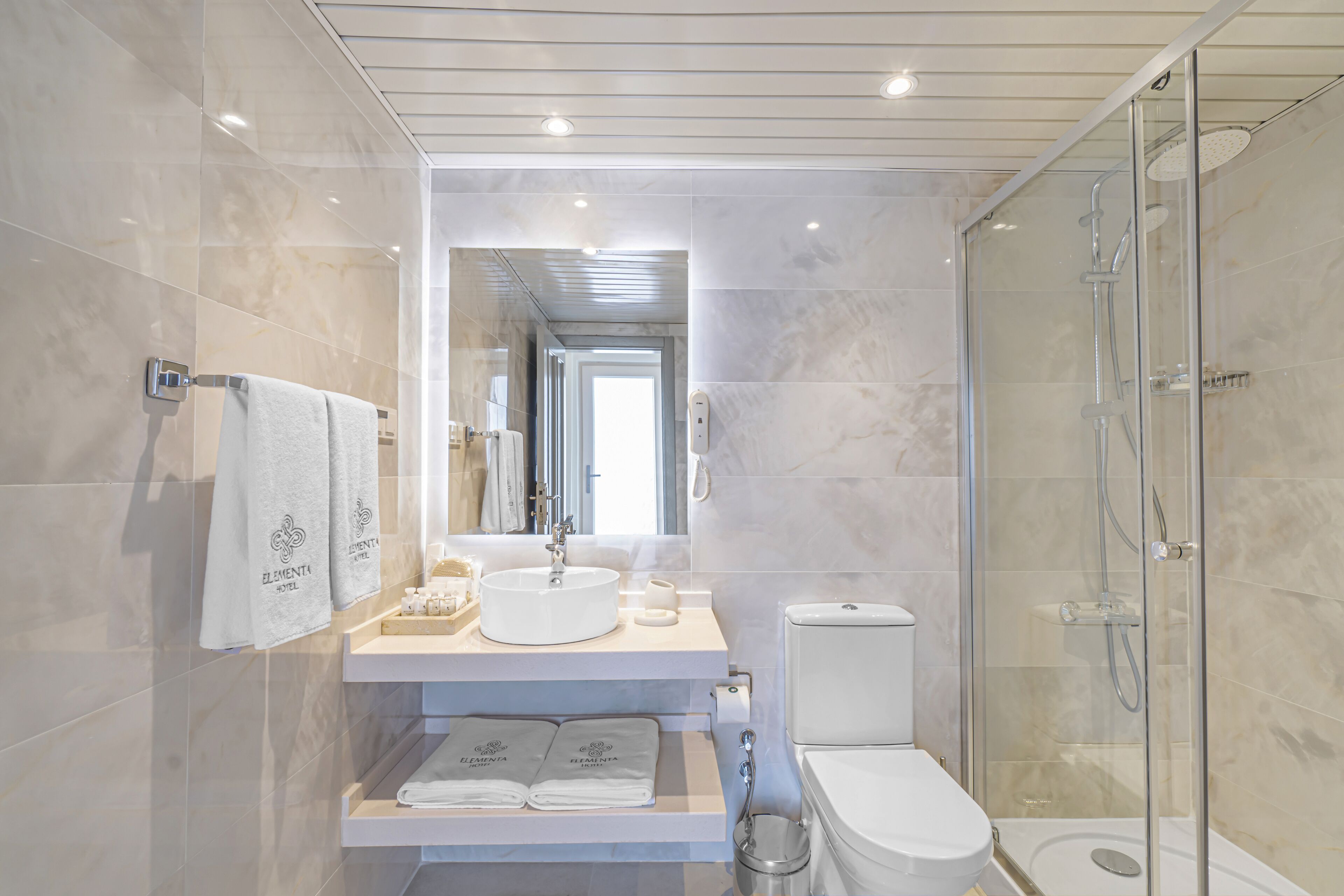 exclusive suite, 1 bedroom, non smoking, sea view | bathroom | shower, hair dryer, slippers, towels