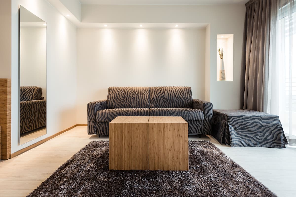 suite (lateral sea view) | living area | flat-screen tv