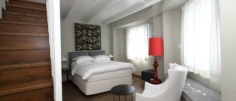 Kamar Quadruple (Maisonette) | Minibar, brankas, kedap suara, dan Wi-Fi gratis