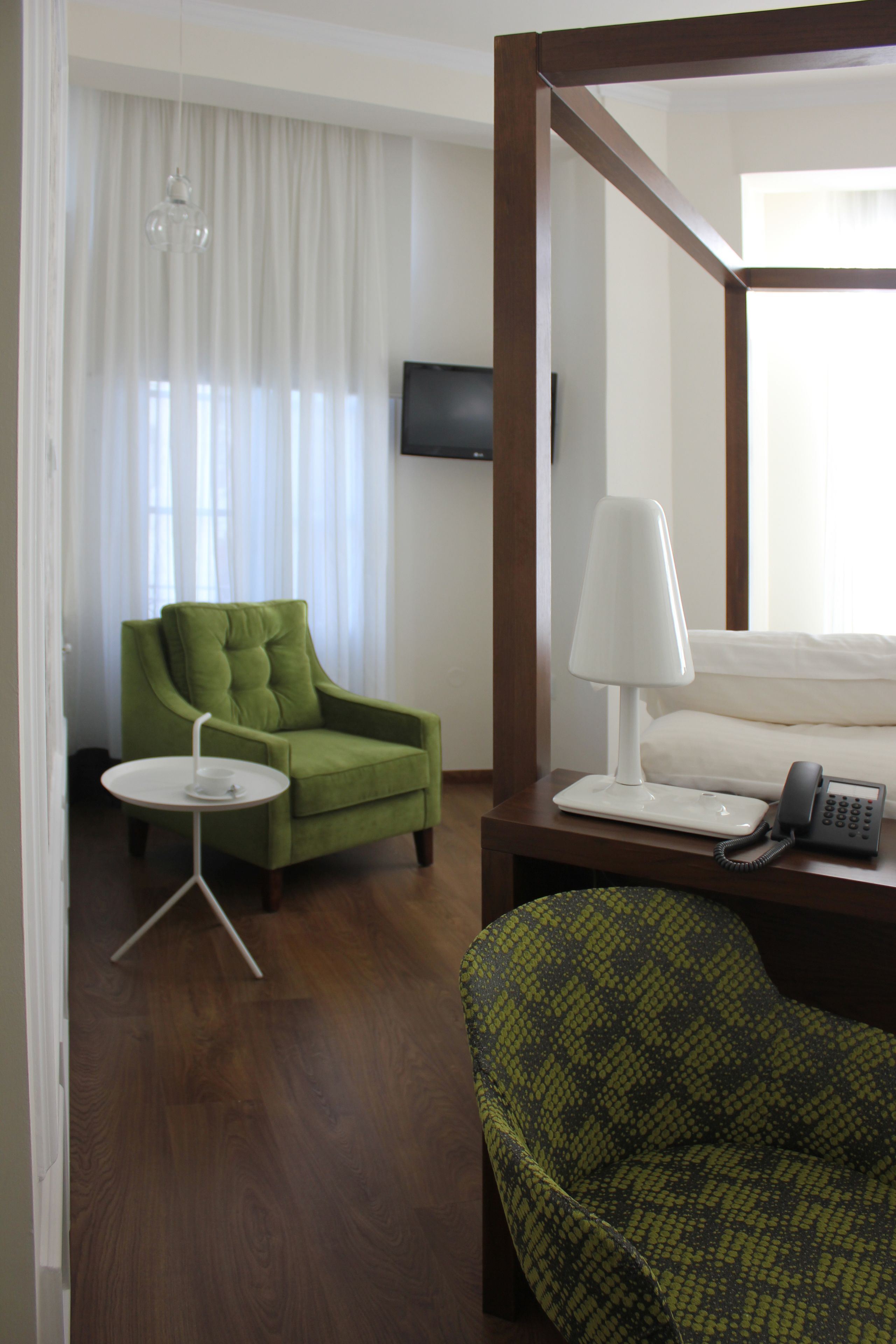 deluxe double room | living area | 32-inch plasma tv with digital channels, tv