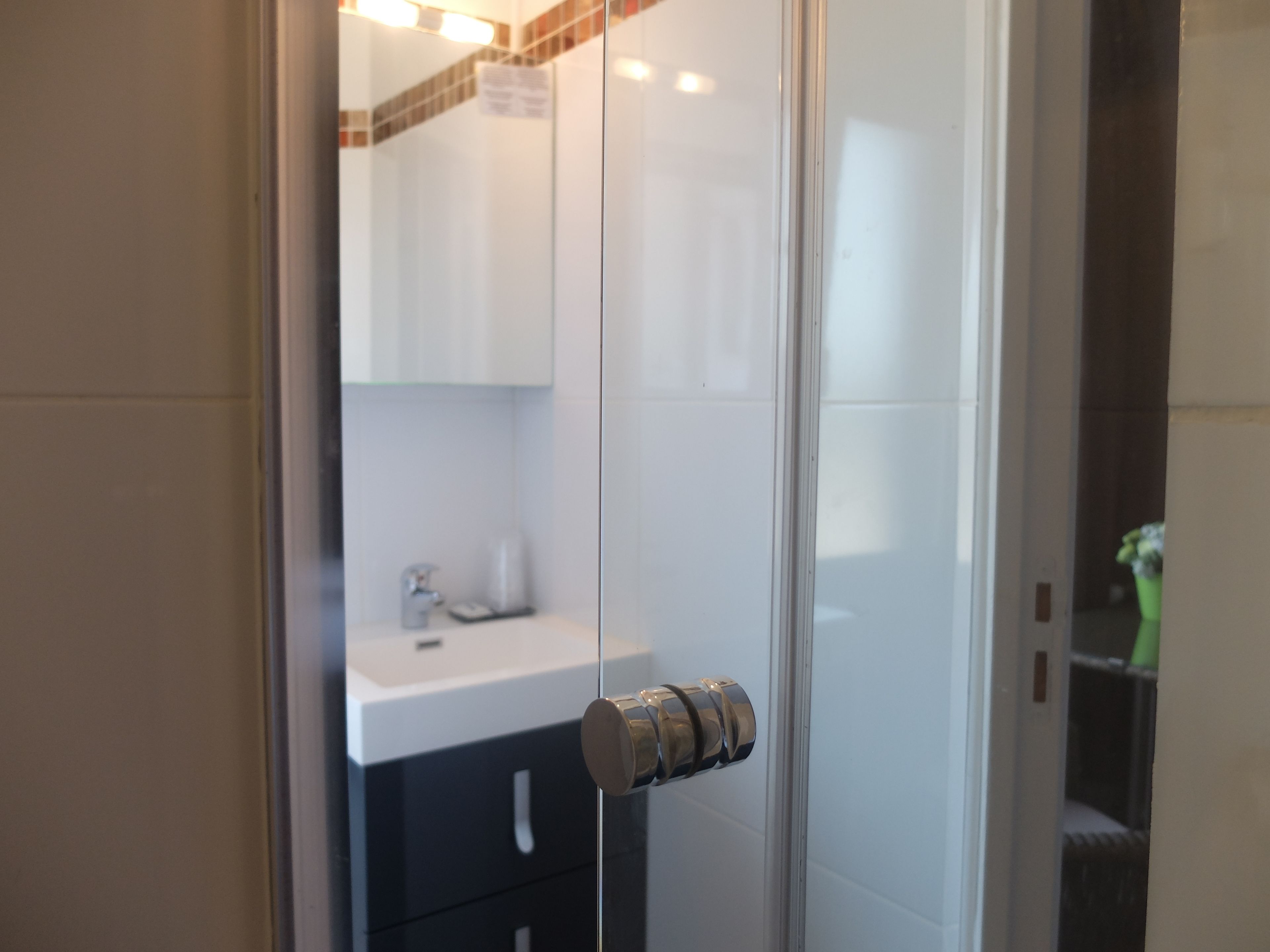 family room | bathroom | shower, hair dryer, towels