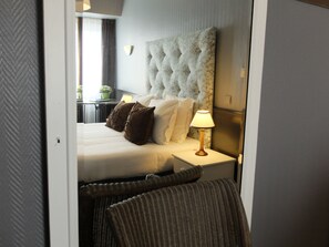 Premium bedding, blackout curtains, free WiFi, bed sheets