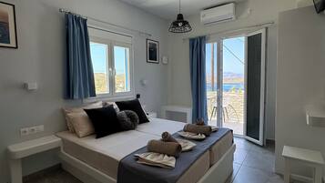 Quarto quádruplo superior | Wi-Fi de cortesia, roupa de cama
