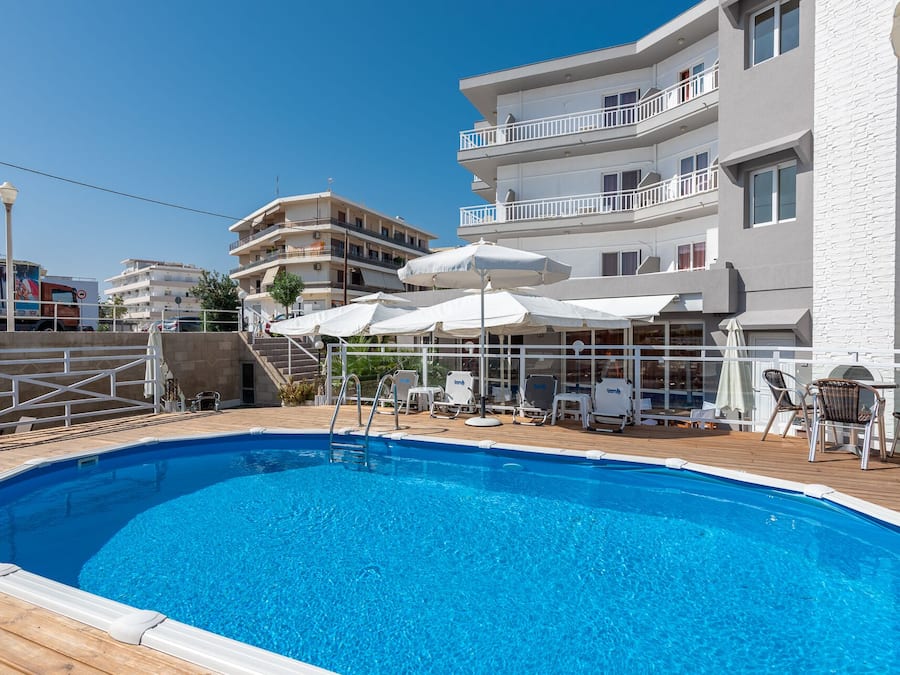 Seasonal outdoor pool, pool umbrellas, pool loungers