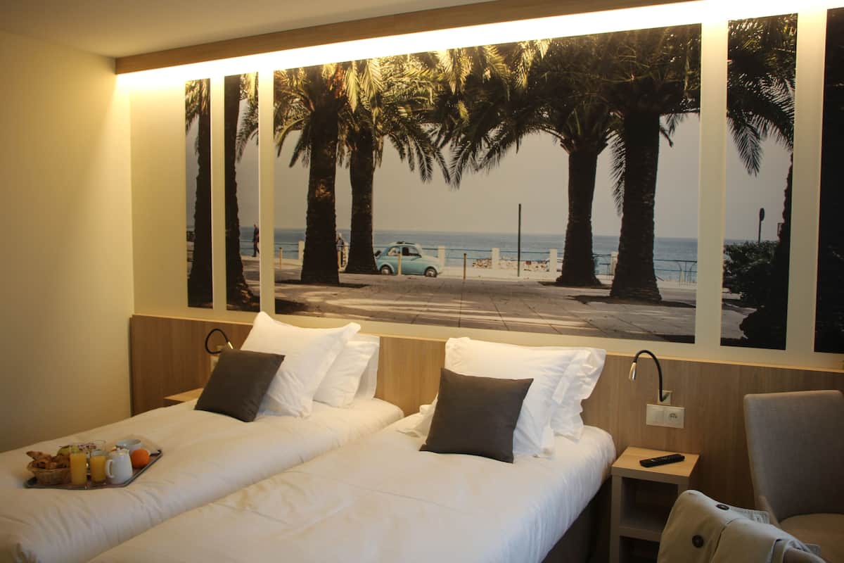 classic twin room | premium bedding, pillow-top beds, desk, soundproofing