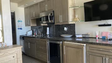 Standard Suite, Kitchenette, Beachfront | Private kitchen | Fridge, microwave, stovetop, coffee/tea maker