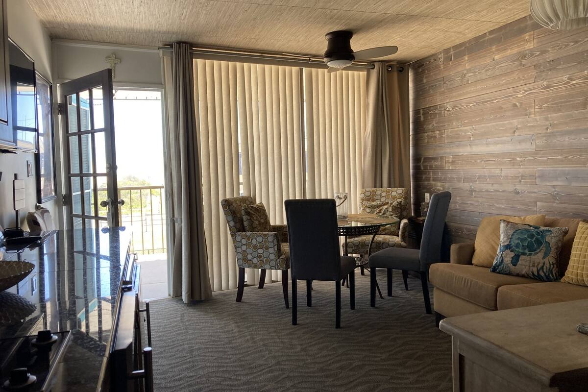 Standard Suite, Kitchenette, Beachfront | Living area | TV