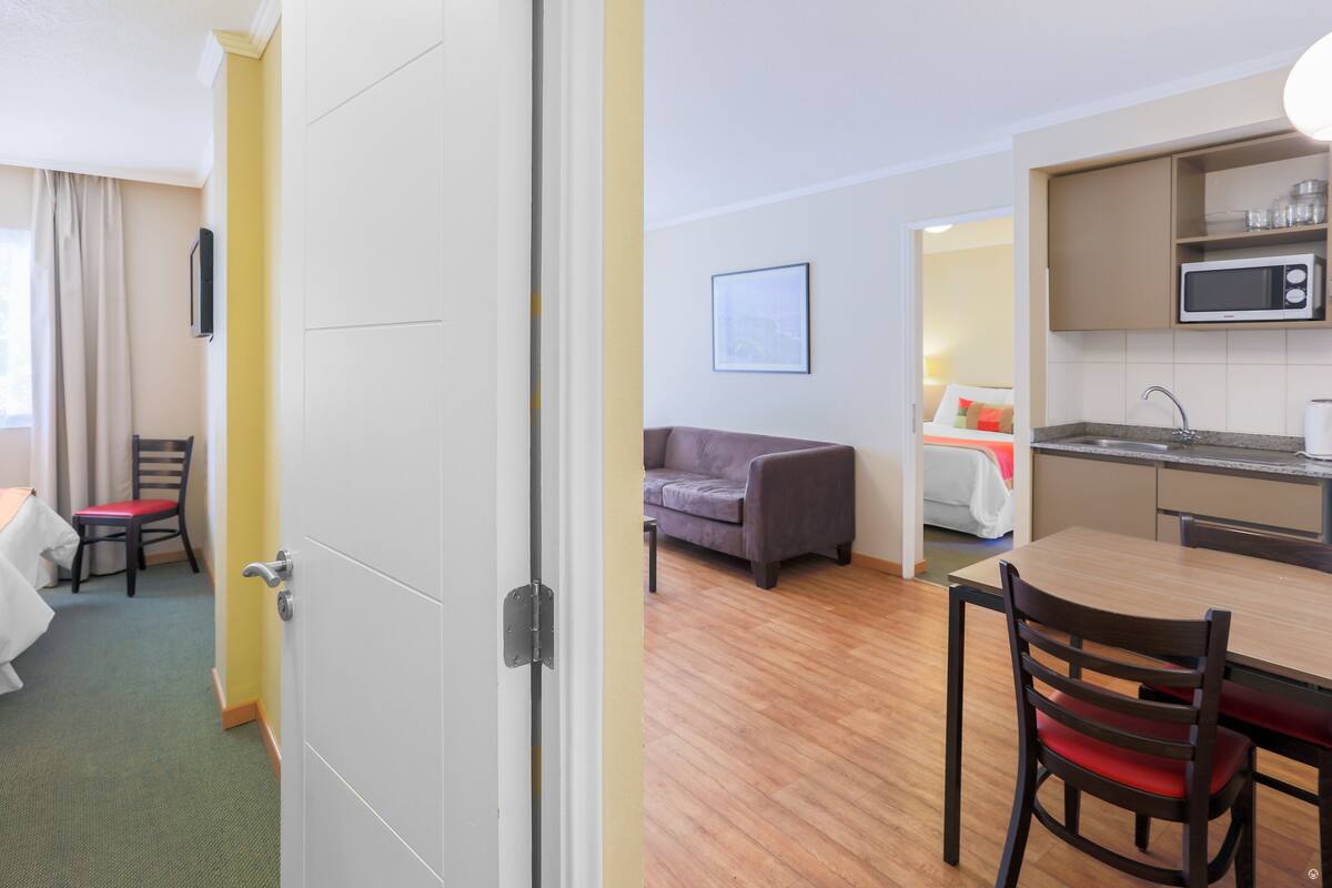 family suite, 2 bedrooms, 2 bathrooms | living area | 42-inch flat-screen tv with cable channels, tv