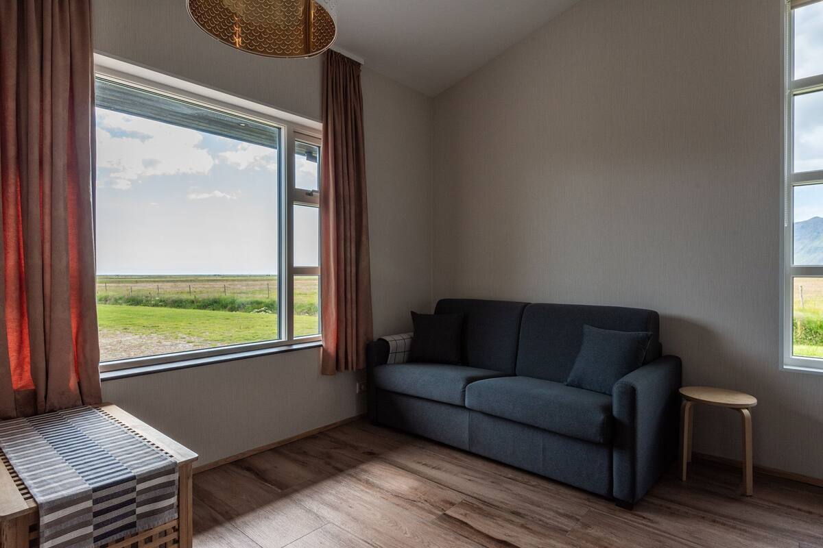 family apartment, 1 bedroom | living room | flat-screen tv, heated floors