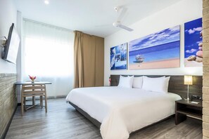 Roupas de cama premium, frigobar, cofres nos quartos, Wi-Fi de cortesia
