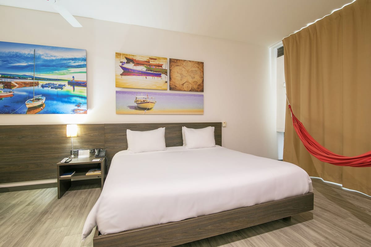 Luxe beddengoed, een minibar, een kluis op de kamer, gratis wifi