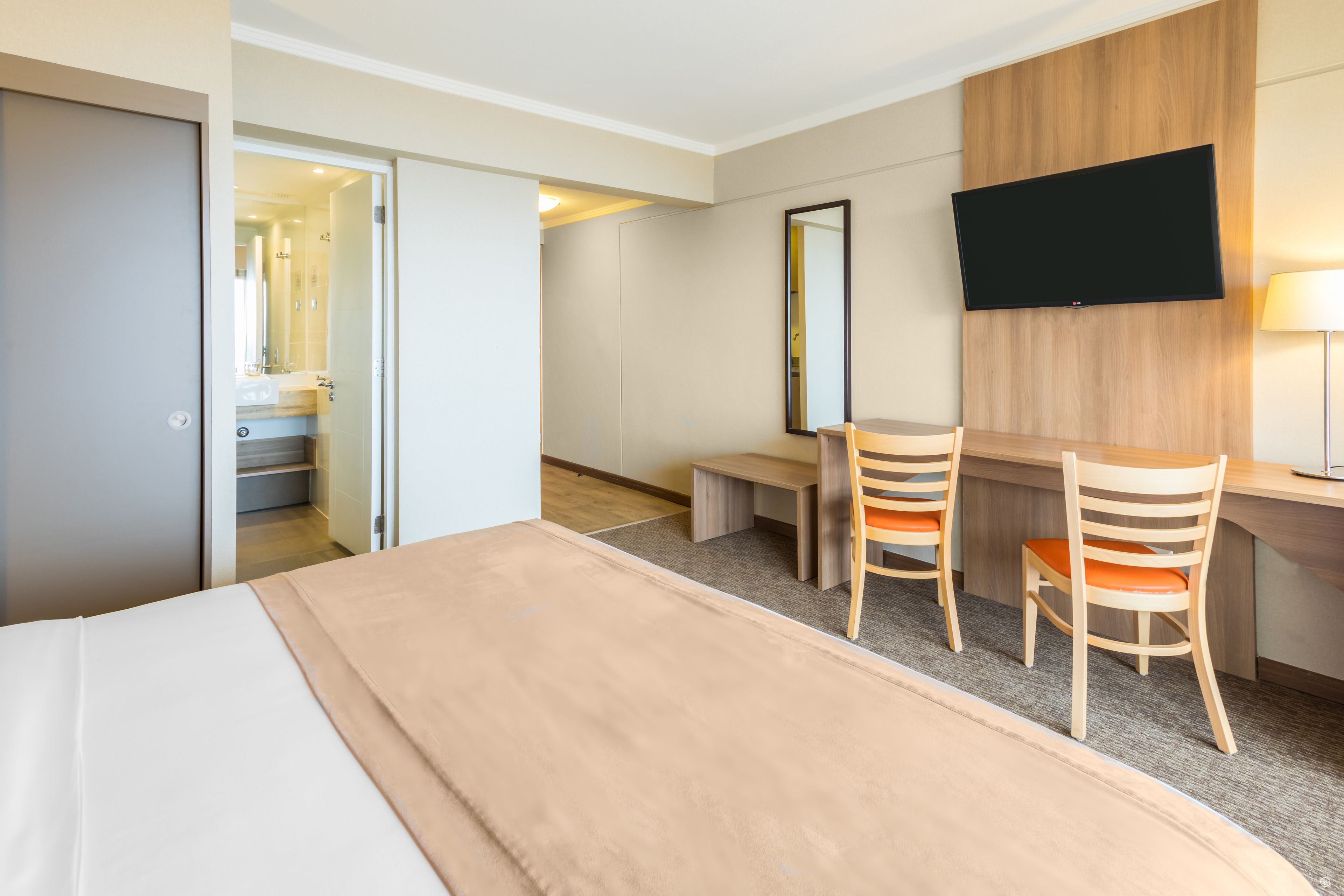 superior room, 1 queen bed, balcony, beach view | minibar, in-room safe, desk, laptop workspace