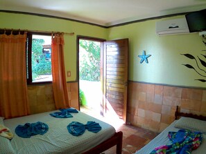 Family Apartment, 1 Bedroom | Minibar, in-room safe, individually decorated, free WiFi