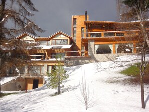 Situated on a slope, this lodge offers scenic views from its large windows.