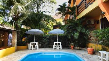 Outdoor pool, pool umbrellas, pool loungers