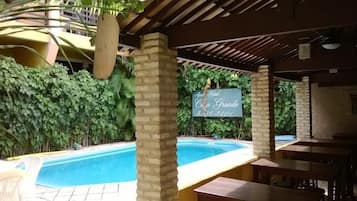 Outdoor pool, pool umbrellas, sun loungers