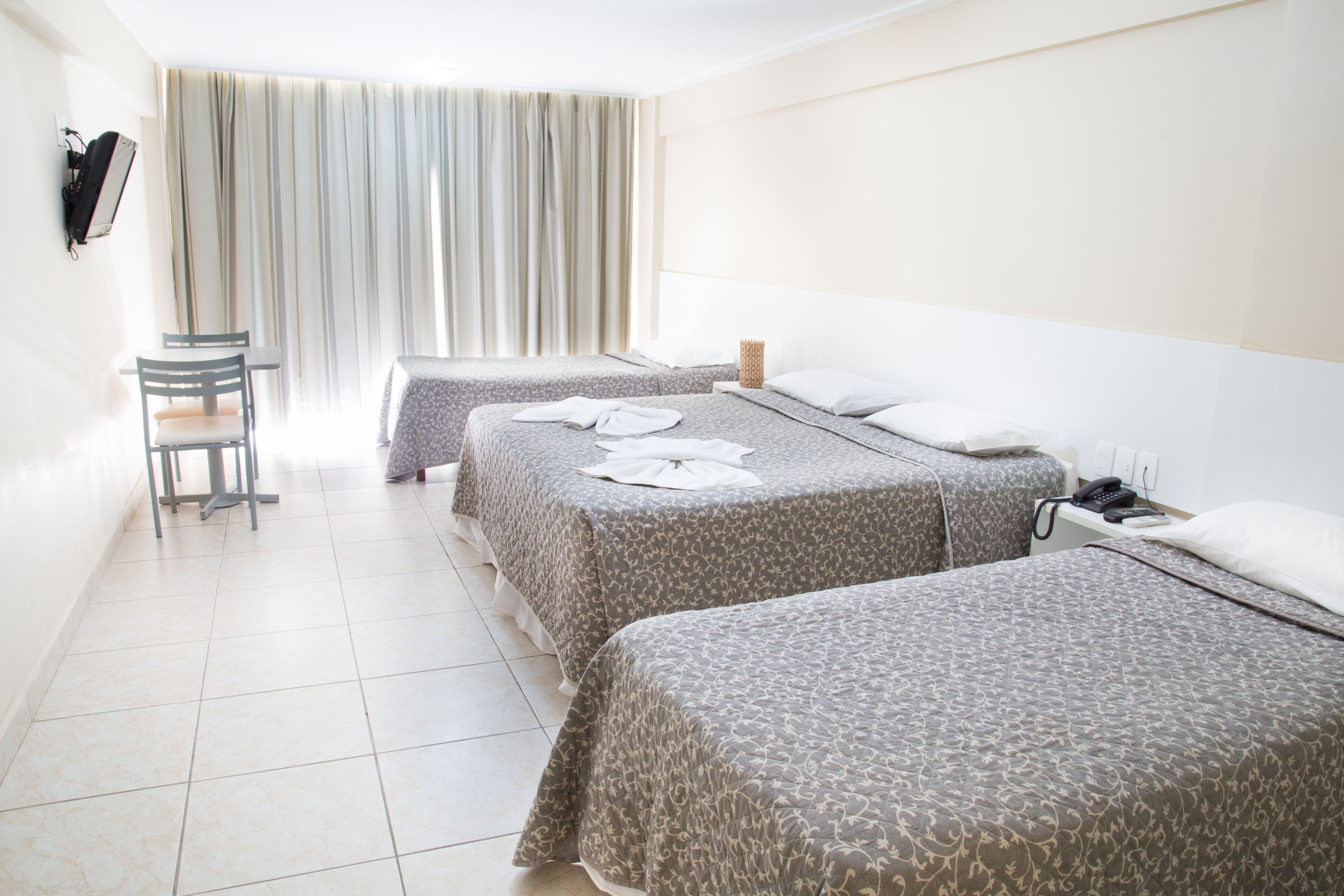 Minibar, desk, blackout curtains, bed sheets