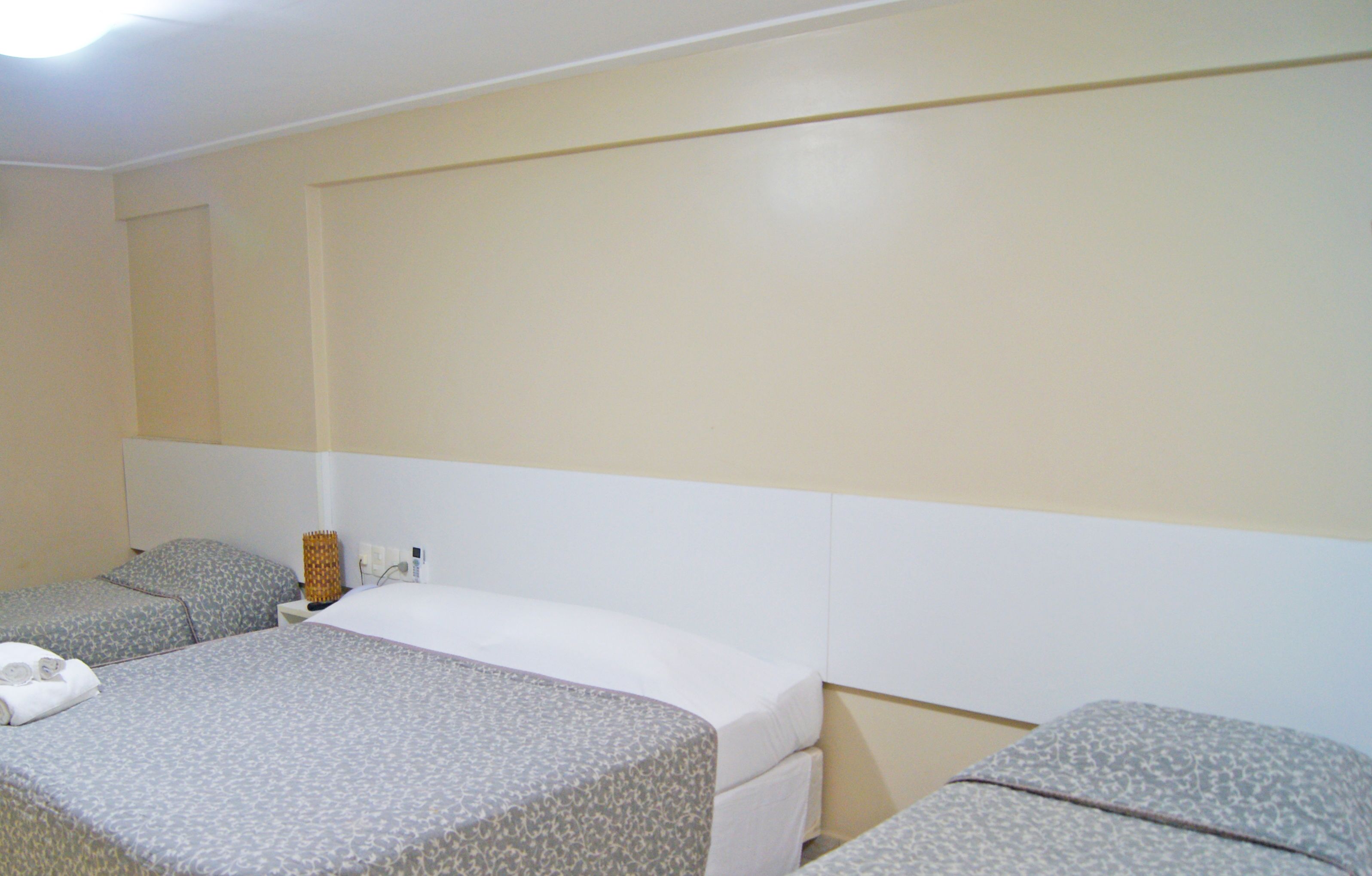 standard quadruple room | minibar, desk, blackout curtains, bed sheets