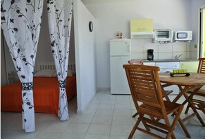 Studio, Sea View | Private kitchen | Full-size fridge, microwave, stovetop, coffee/tea maker