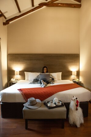 Hypo-allergenic bedding, desk, laptop workspace, blackout curtains