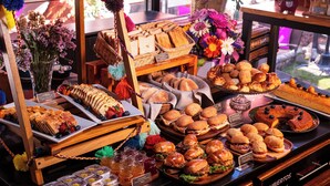 A buffet with various food items including sandwiches, pastries, and desserts. - Union Hotel Cusco (Cusco)