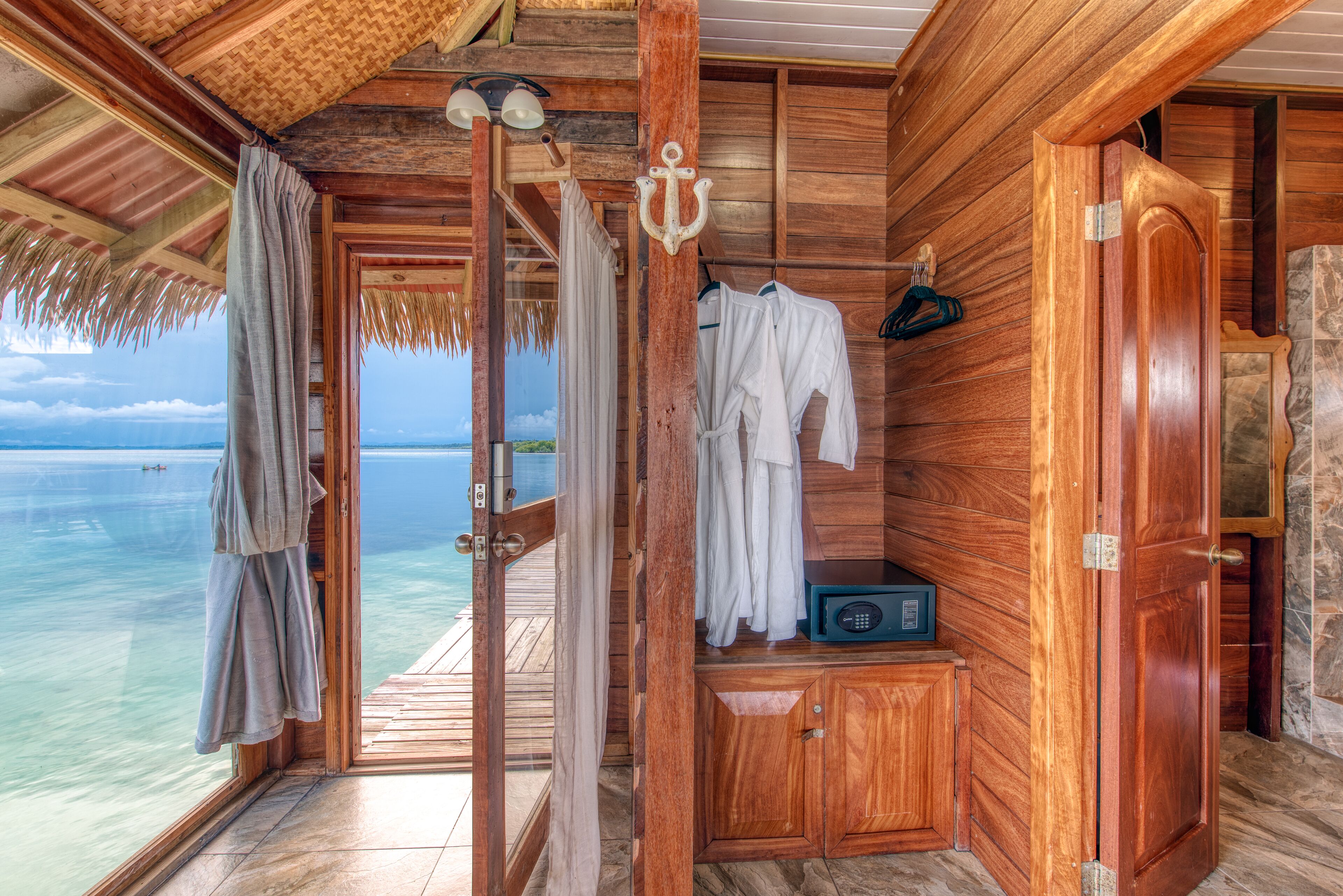 deluxe bungalow, ocean view | egyptian cotton sheets, down duvets, pillow-top beds, in-room safe