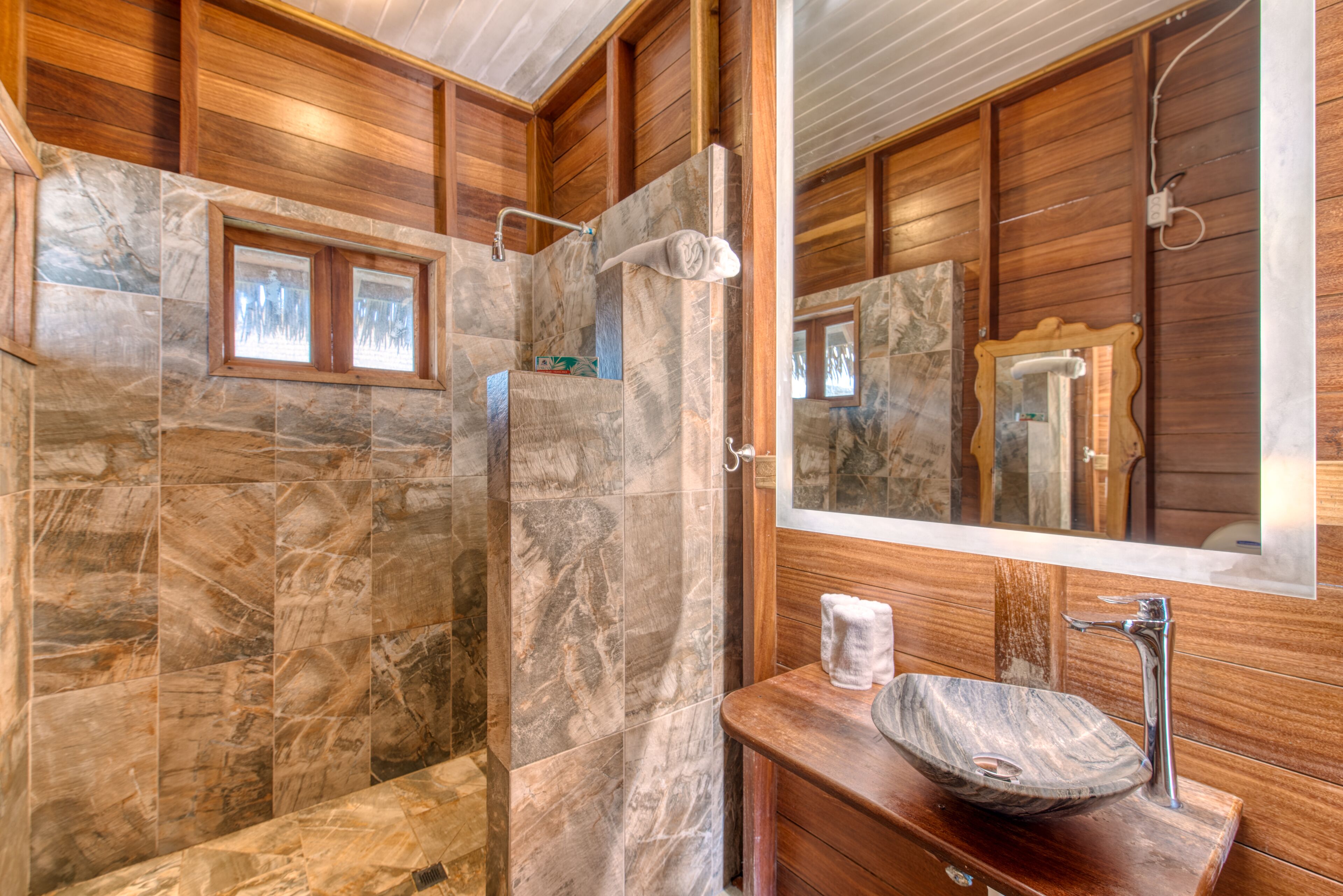 shower, free toiletries, hair dryer, towels