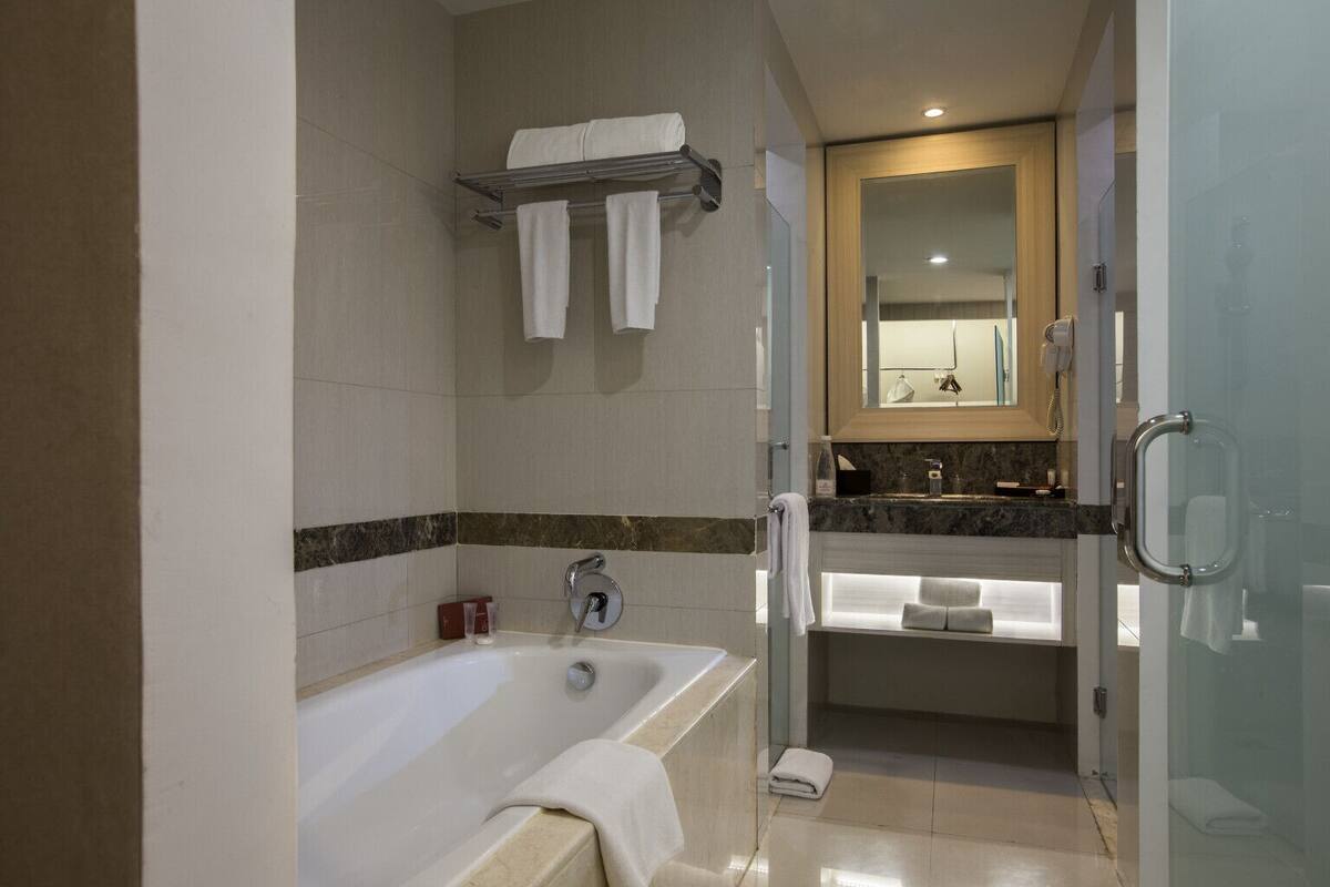 premier room | bathroom | free toiletries, hair dryer, slippers, towels