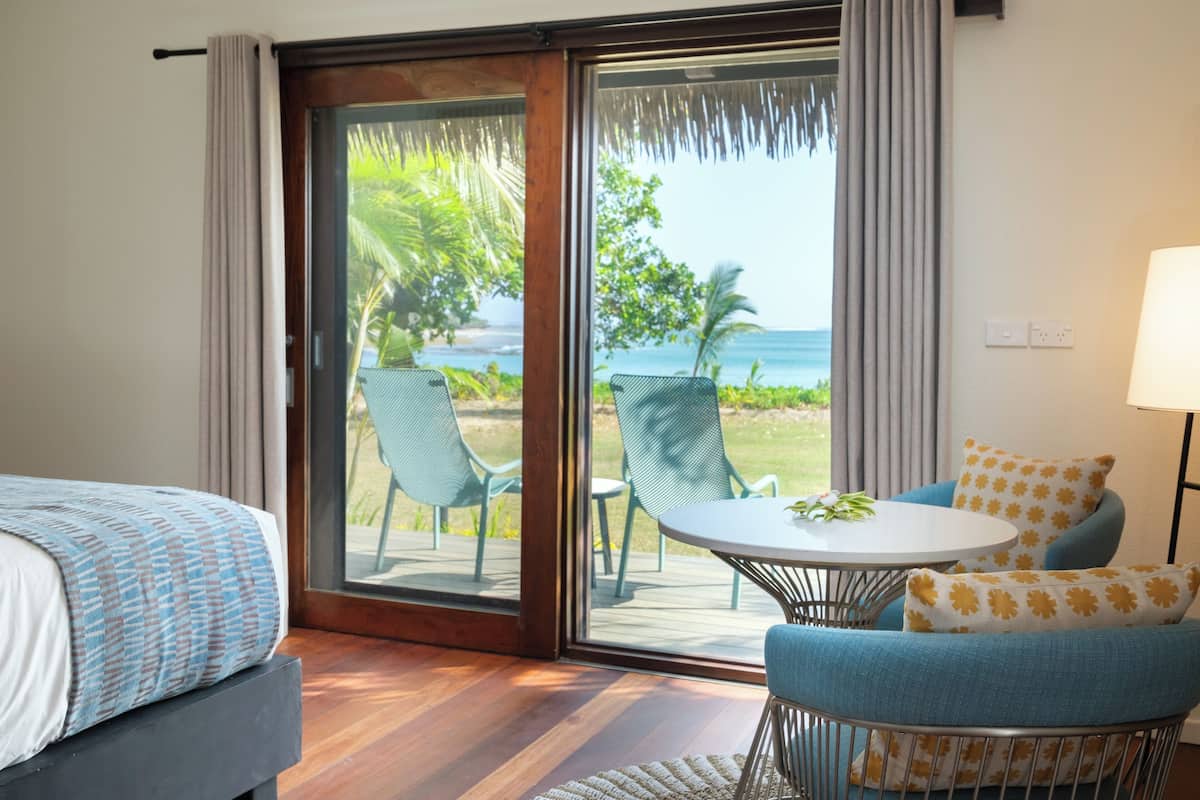 deluxe beachfront bure | 1 bedroom, premium bedding, in-room safe, desk