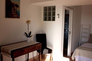 Standard Double Room | Minibar, in-room safe, desk, blackout drapes