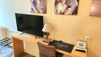 Desk, free WiFi, bed sheets