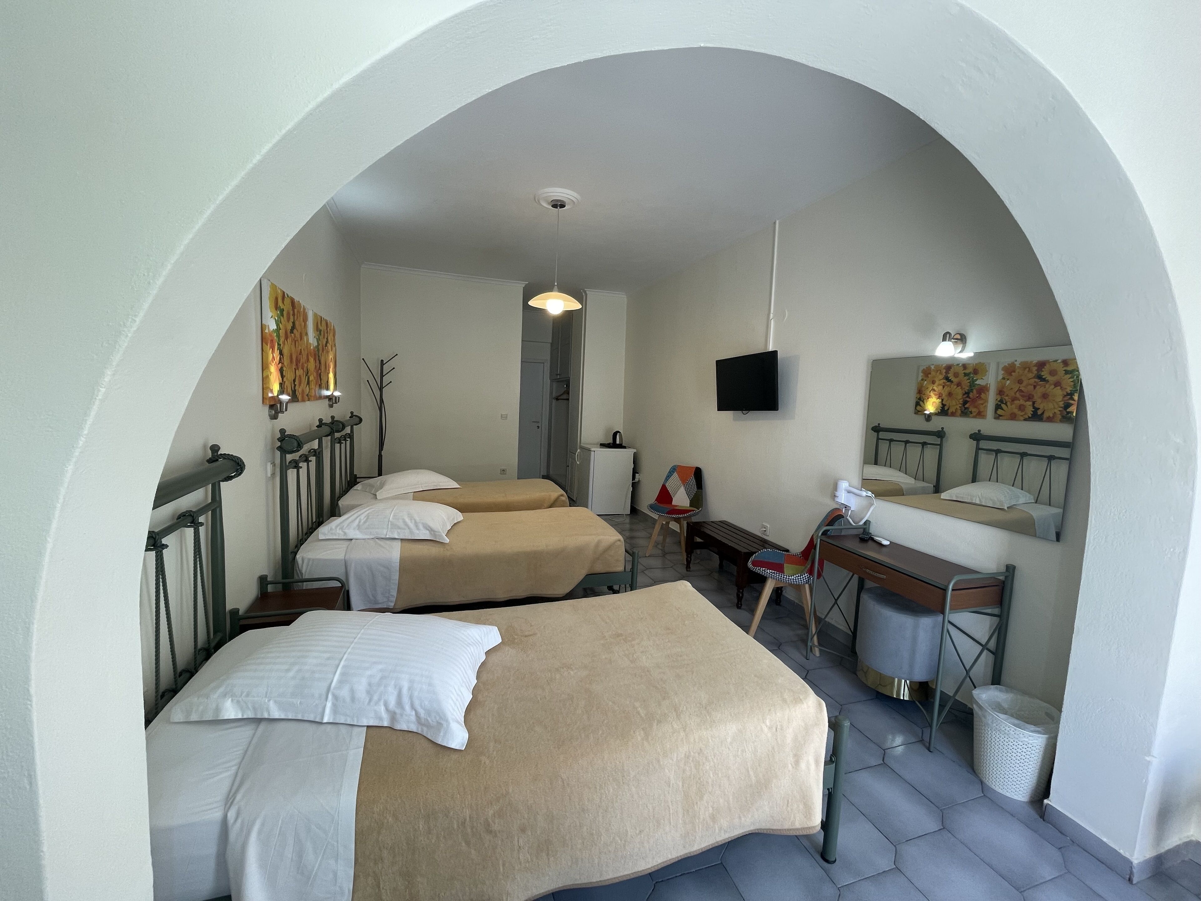 economy triple room | 1 bedroom, in-room safe, laptop workspace, iron/ironing board