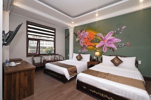 Family Quadruple Room | Hypo-allergenic bedding, down duvets, pillow-top beds, minibar