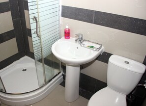 Shower, free toiletries, hair dryer, towels