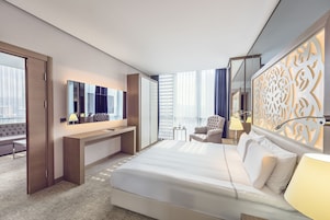 Ropa de cama de alta calidad y minibar 