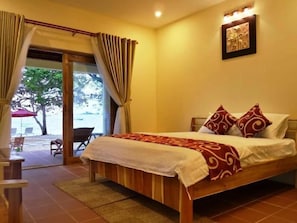 Bungalow, Beachfront | Individually decorated, individually furnished, blackout drapes - Wild Beach Phu Quoc Resort (Phu Quoc)