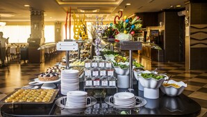 A buffet setup with various food items and dishes. - White Gold Hotel & Spa (Alanya)
