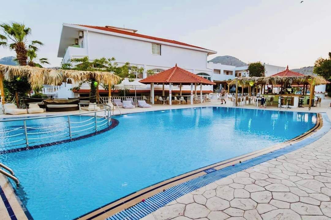 2 outdoor pools, pool umbrellas, sun loungers
