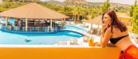 2 outdoor pools, pool umbrellas, pool loungers