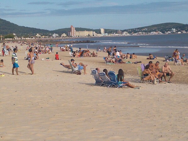 On the beach, beach umbrellas, beach towels