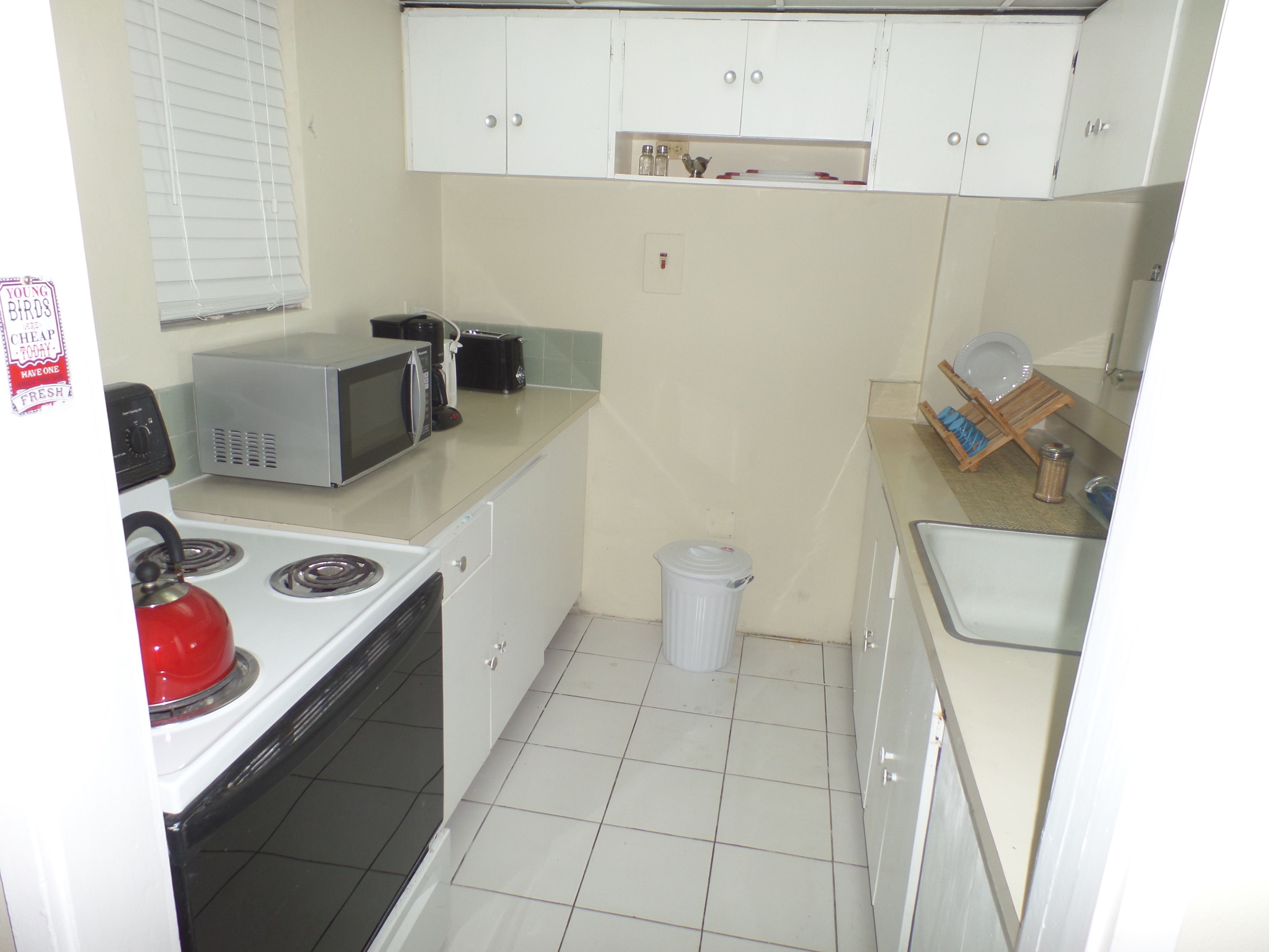 apartment, 1 bedroom | private kitchen | full-sized fridge, microwave, stovetop, cookware/dishes/utensils