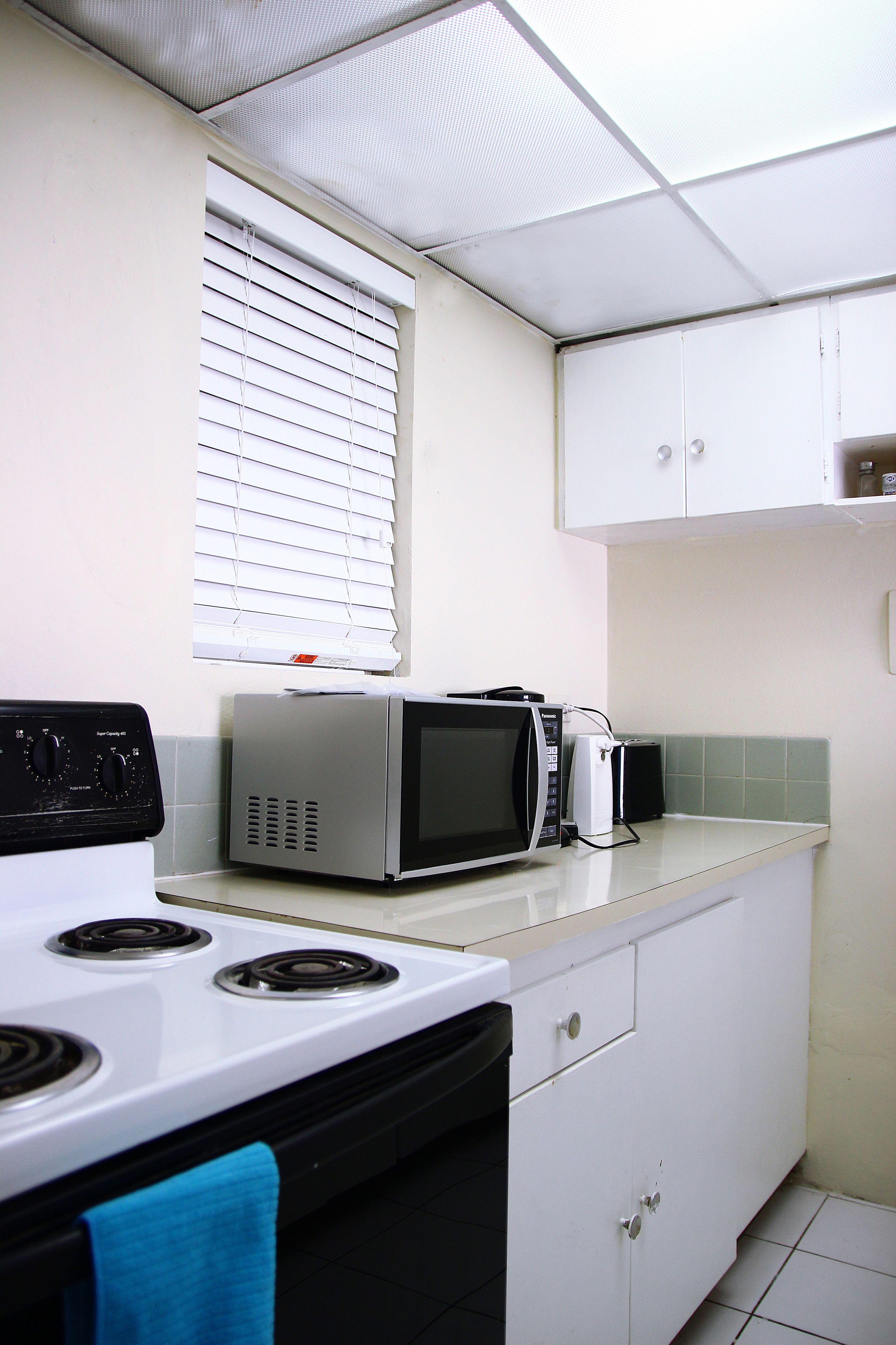 apartment, 1 bedroom | private kitchen | full-sized fridge, microwave, stovetop, cookware/dishes/utensils