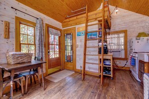 Standard Cabin, 1 Bedroom, Non Smoking (Secret Cottage) | Living area | 33-inch Smart TV with satellite channels, TV, Hulu - Beachside Boutique Inn – Folly Beach Rooms & Private Cottages (Folly Beach)