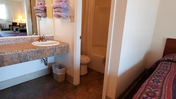 Room, 1 Queen Bed, Non Smoking | Bathroom | Combined shower/tub, free toiletries, hair dryer, towels