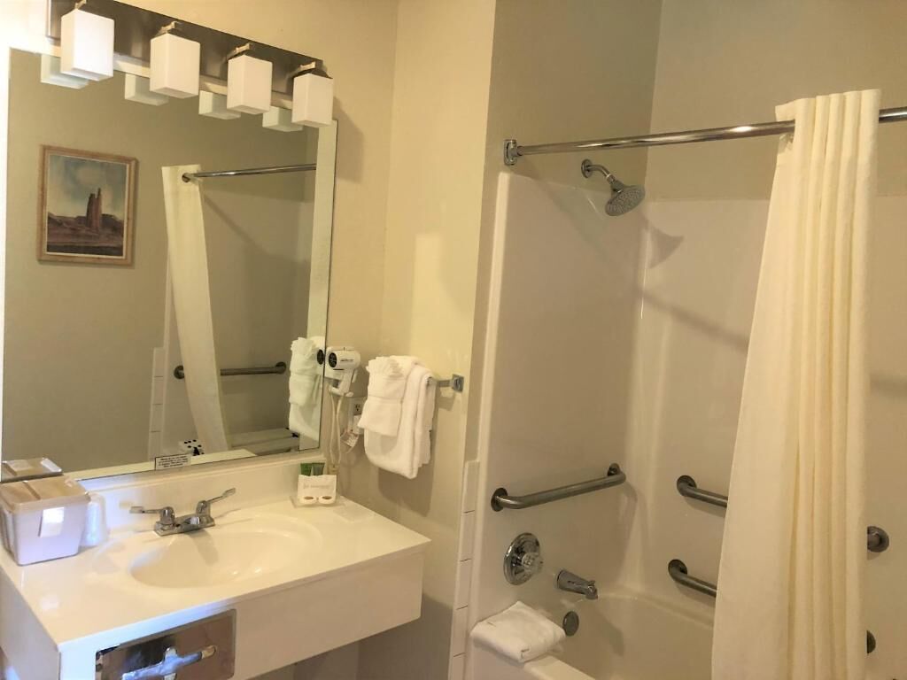 combined shower/bathtub, hair dryer, towels, soap