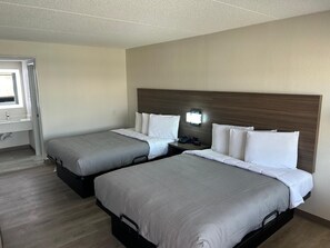 Seprai premium, bantalan ekstra lembut, meja kerja, dan Wi-Fi gratis