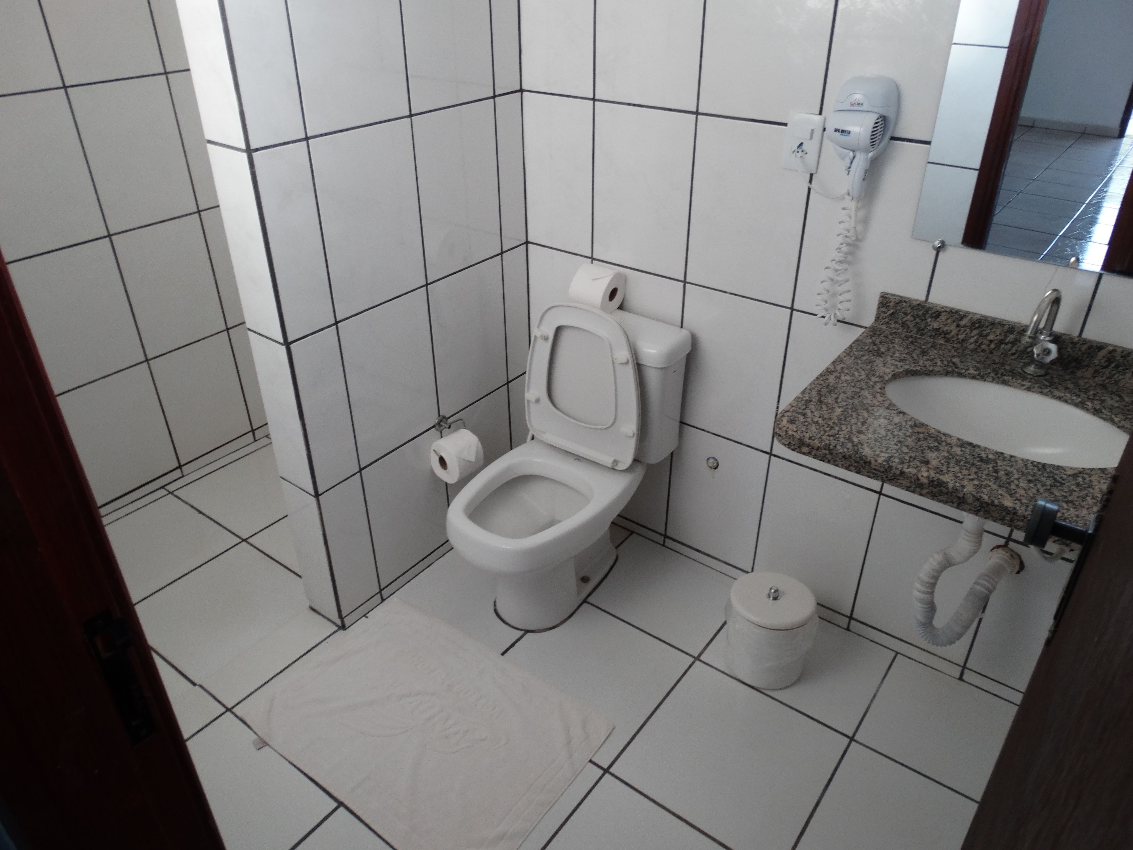 standard triple room | bathroom | shower, hair dryer, towels