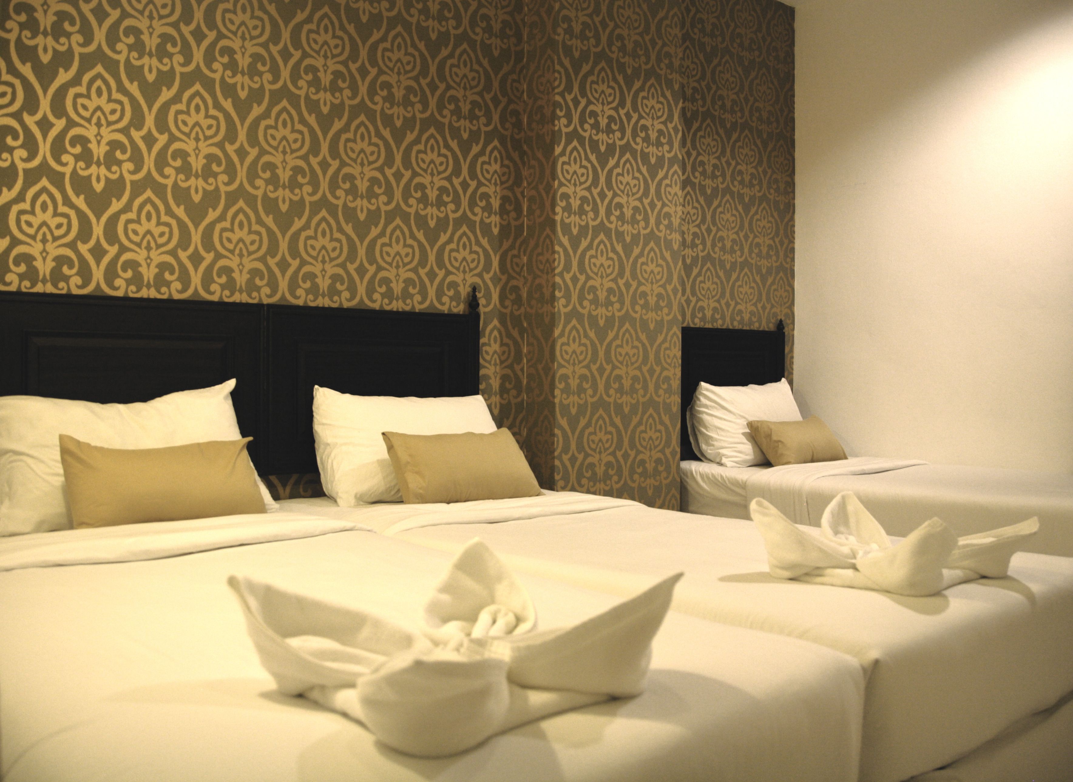 Family Room | In-room safe, individually decorated, blackout drapes, rollaway beds