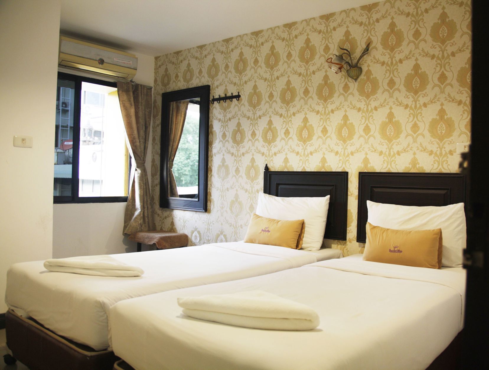 In-room safe, individually decorated, blackout curtains, rollaway beds